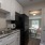 Well-lit kitchen with ample counter space