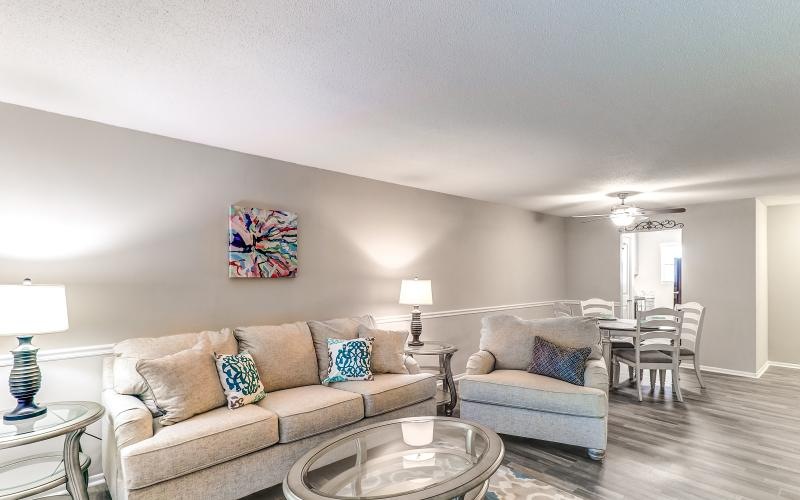 a living room with a couch and a coffee table